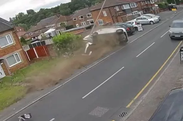 Horror CCTV shows moment hatchback wipes out parked cars and lamppost