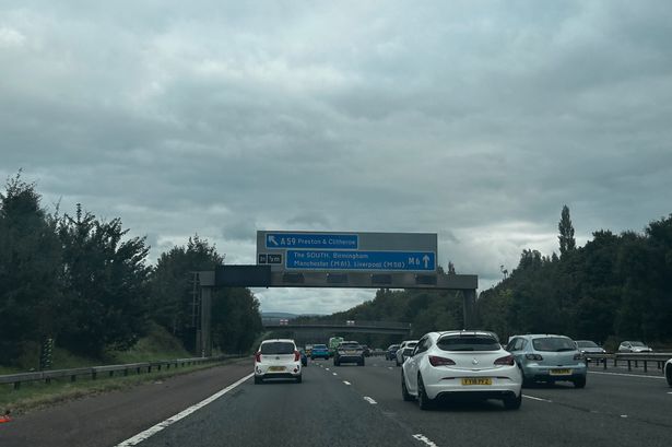 Highways bosses issue warning as flags appear on Lancs motorway bridges