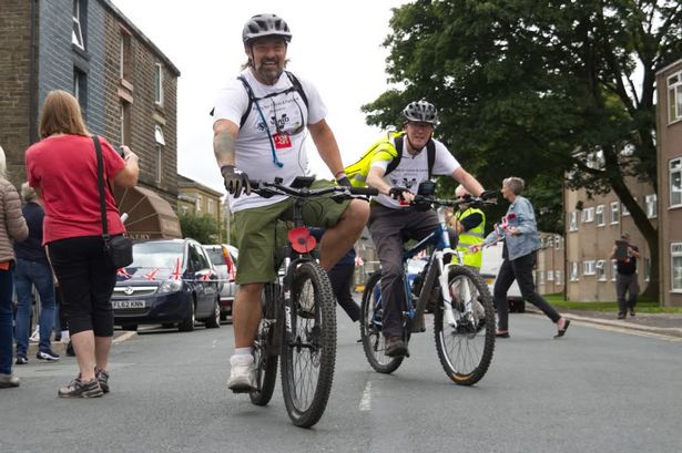Exhausted veterans complete 264-mile cycle for three charities