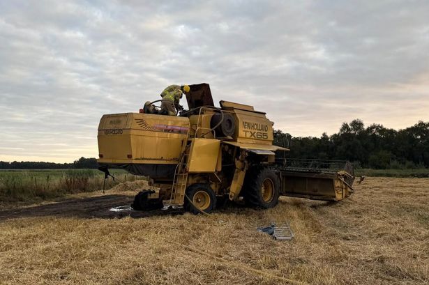 Combine harvester goes up in flames as firefighters tackle blaze for hours