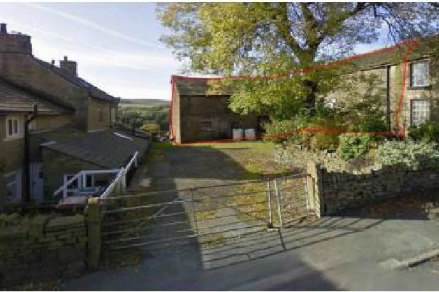 Changes to Lancs village barns conversion approved after fence row