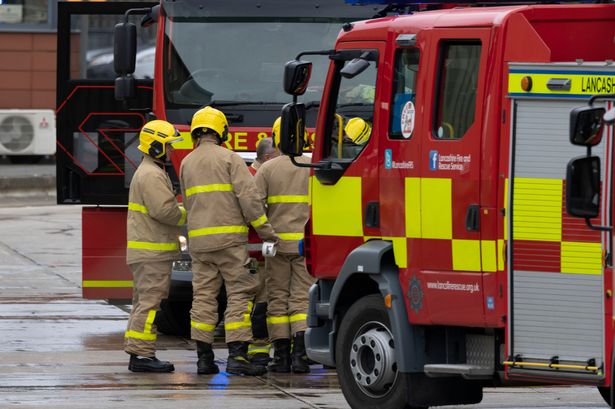 15 fire crews tackle huge building blaze as people told ‘avoid area’