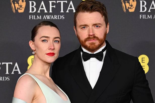 Saoirse Ronan and husband Jack Lowden welcome first child as pair spotted with pram
