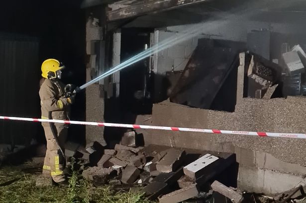 Car spraying workshop goes up in flames as fire crews tackle blaze overnight