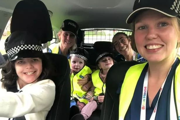 Children from local hospice enjoy a day as police officers