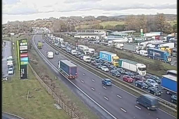 Live M61 traffic updates as crash causes further chaos and TWO-HOUR delays