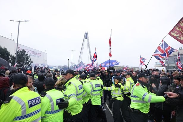 Police issue update after hundreds of protestors descend on seaside town