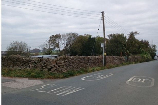 Controversial plans to build cluster of homes on moorland knocked back