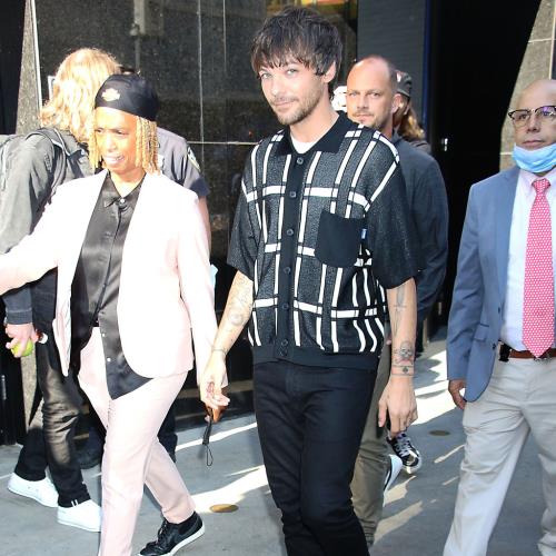 Louis Tomlinson outs himself as unnamed celebrity who refused photos on Robbie Williams flight