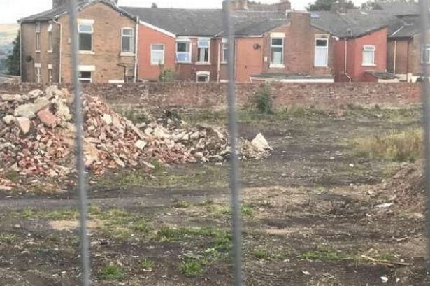 Infilled quarry could become eight new homes