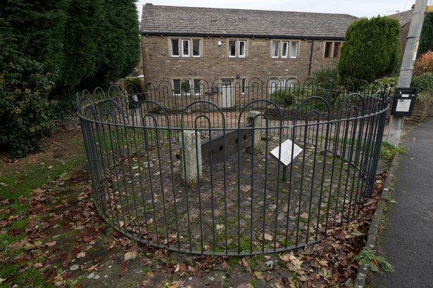 The 500-year-old village stocks fenced-off because tourists can’t help themselves