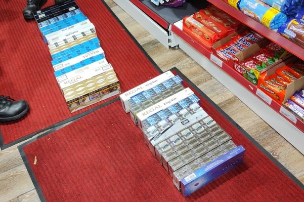 15,000 illegal cigarettes and vapes found hidden behind kickboards in shop raid