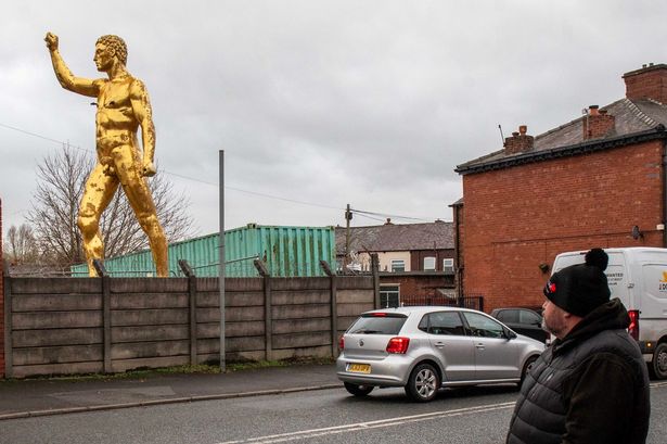 ‘Golden Balls’ statue reinstated after three years following community campaign