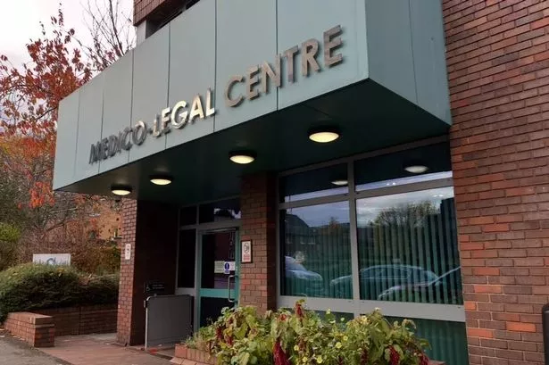 Couple found dead in bed together with positive pregnancy test beside them