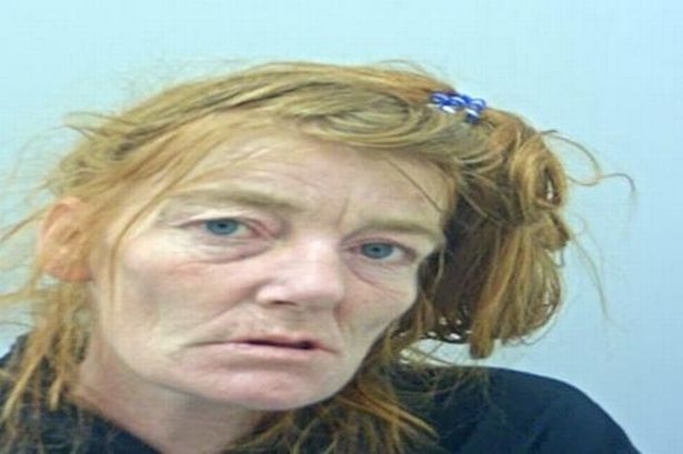 Police release mugshot of wanted woman, 40, in appeal to track her down