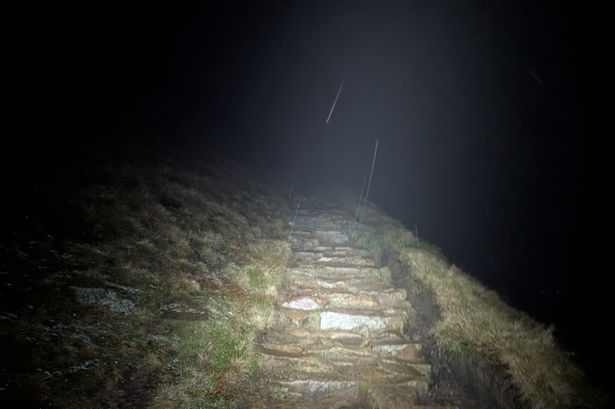 Volunteers battle sleet and snow in dramatic Pendle Hill rescue