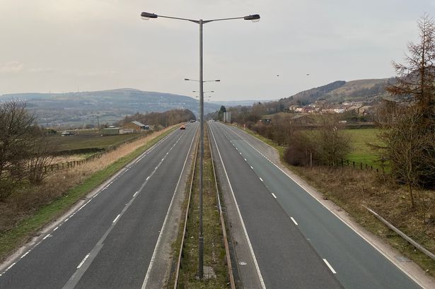 Person cut free from car by firefighters after motorway crash