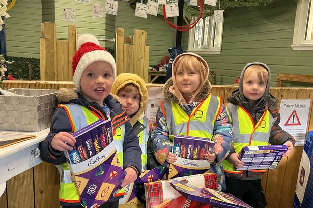 Nursery tots visit food banks with Christmas selection boxes