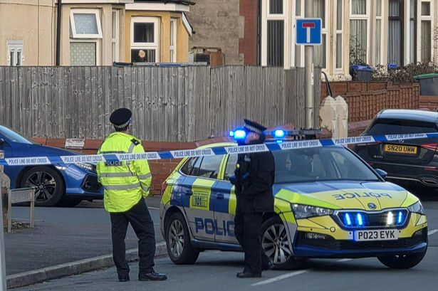 Police cordon off Blackpool street after serious attack as two men arrested