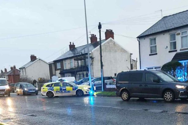 Police car crashes into van and lamppost while responding to 999 call