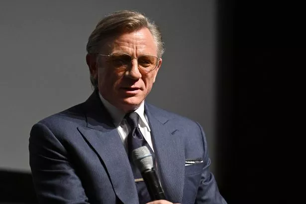 Bond icon Daniel Craig defends ‘over the top’ Knives Out detective and says it’s ‘whole point of movie’