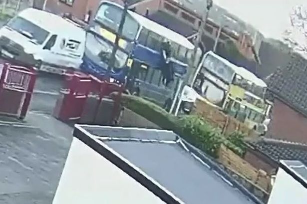 CCTV captures moment three schoolboys plunge from window of double decker bus