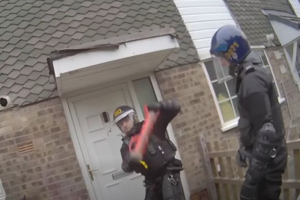 Dramatic moment police in riot gear storm Blackburn house in New Year’s Eve raid
