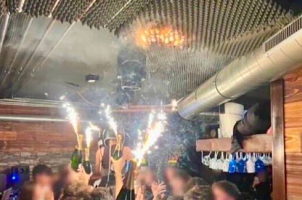 Exact moment Swiss ski resort went up in flames with champagne sparklers touching roof