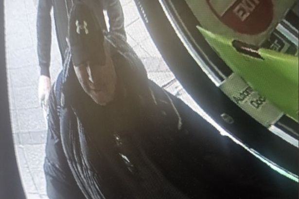 Police want to speak to this man after woman ‘racially abused’ in Darwen charity shop