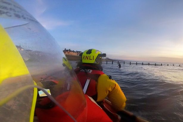 Rescuers rush to woman in sinking sand on North Wales beach as tide ‘came to waist’