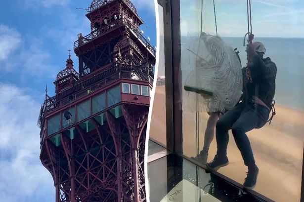 Fearless window cleaners dangle 380ft in the air to clean Blackpool Tower