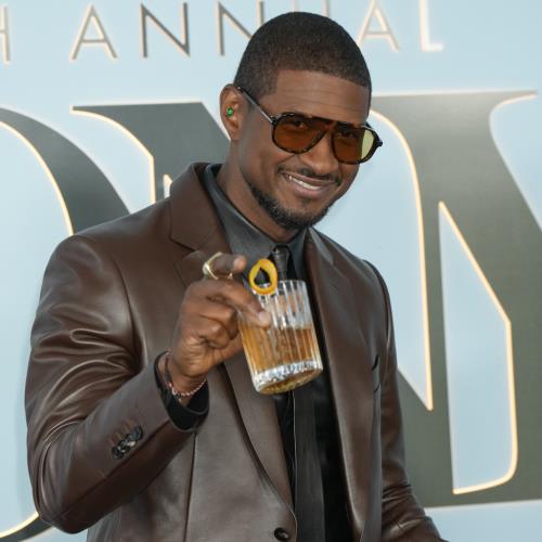 Usher kicks fan off stage after ‘awkward’ dance moment