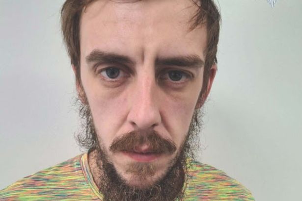Police search for man wanted on recall to prison